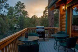 Mountain-View Log Cabin with Wraparound Deck - Image 5
