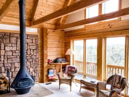 Mountain-View Log Cabin with Wraparound Deck - Image 4